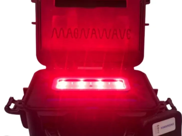 Red light therapy being used on a horse